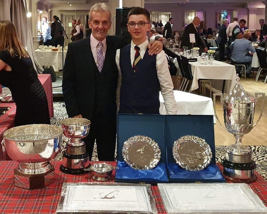 Dennis & grandson with trophies won at SNFC Dinner.JPG