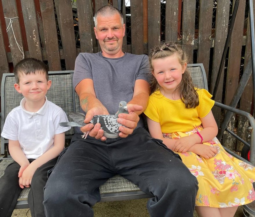 Andy McKenna with his winner and children.jpeg